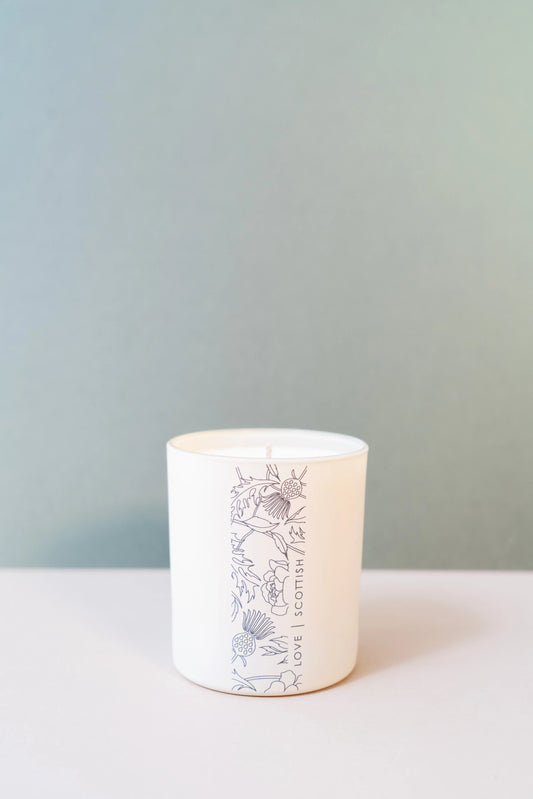 Love Scottish Candle on a Green Background