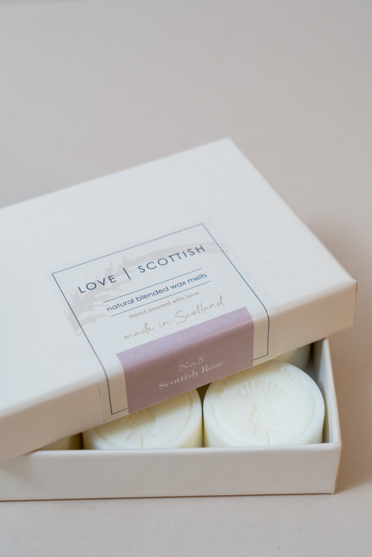 Scottish Rose Wax Melts on a White Background