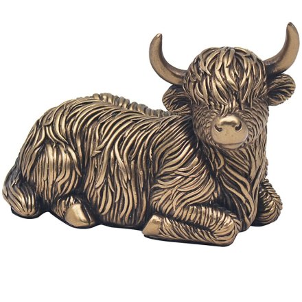 Bronze laying down cow