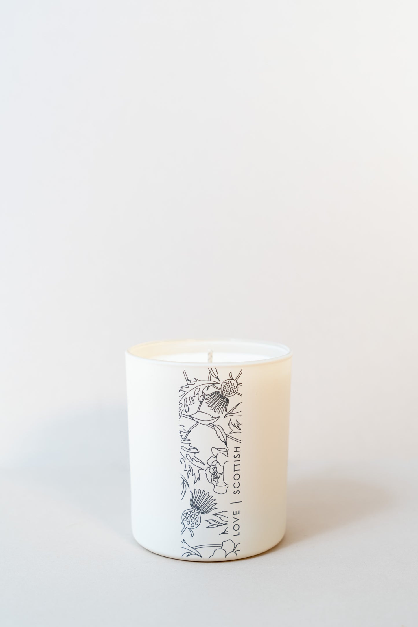 Love Scottish Candle on a White Background