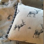 Tuppence-Long Grey Stag Cushion with Pompom